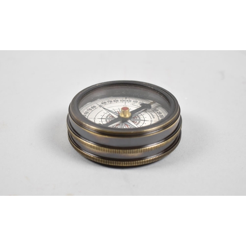 58 - A Reproduction Circular Pocket Compass, 