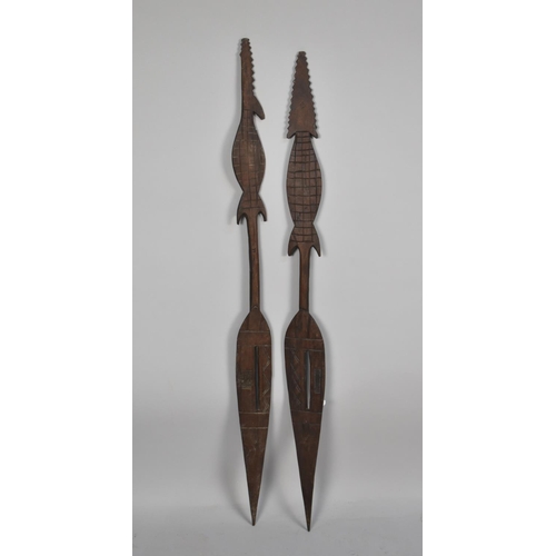 87 - A Pair of African Souvenir Carved Wooden Paddles, Decorated with Geometric Patterns, Handles in the ... 