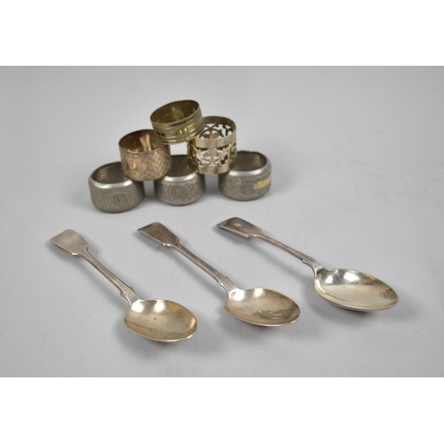 95 - A Collection of Pewter and Silver Plated Napkin Rings and Three Spoons