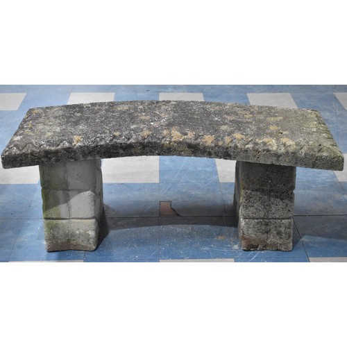 476 - A Reconstituted Stone Crescent Shaped Garden Bench, 122cms Long