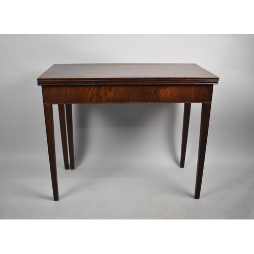 484 - A Mahogany Lift and Twist Tea Table on Tapering Square Supports, 92cm wide