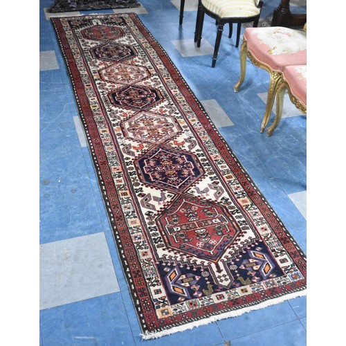 482 - A Persian Patterned Runner, 294x75cms