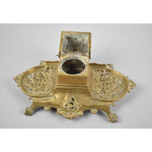 308 - A French Style Brass Desktop Inkwell, Missing Liner, Four Claw Feet and Two Pen Rests, 24cm Wide