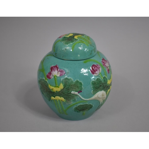 322 - A 20th Century Chinese Ginger Jar and Cover, Wang Bing Rong Type decorated in Relief with Lily Pads,... 