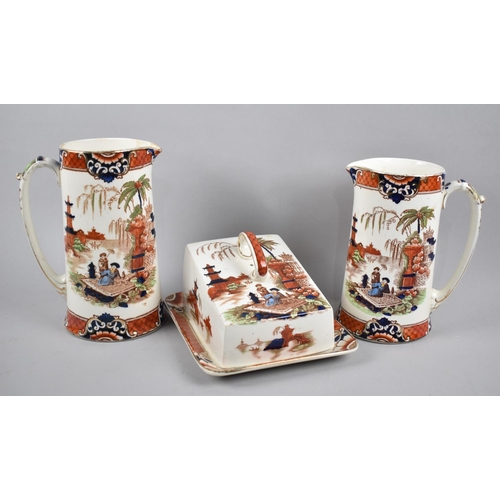 324 - Two Early 20th Century Burma Pattern Graduated Jugs and a Matching Cheese Dish and Cover