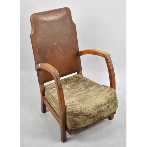 491 - A Mid 20th Century Carved Oak Framed Hide Back Armchair