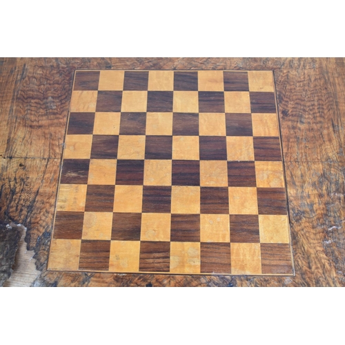 81 - A Victorian Inlaid Walnut Games Table with Chess Board Top, Turned Supports and Scrolled Feet, Water... 