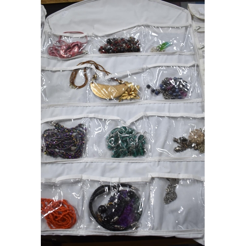 169 - Four Hangers Containing Large Quantity of Costume Jewellery