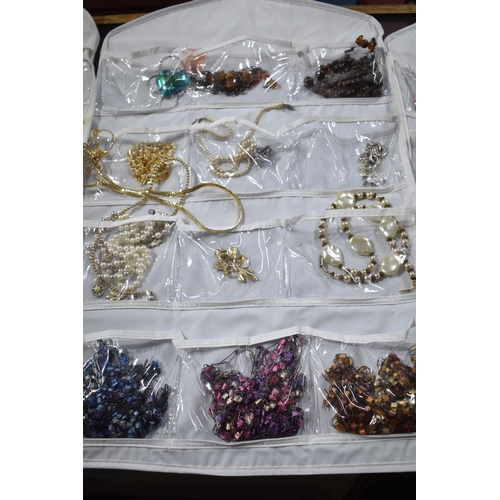 169 - Four Hangers Containing Large Quantity of Costume Jewellery