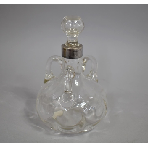 366 - A Silver Topped Three Handled Glass Decanter with Stopper, 20cm high