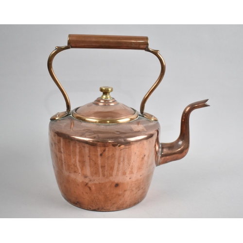 84 - A Large Copper Kettle, 29cm high