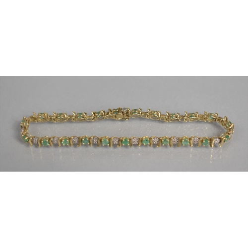 29 - A 9ct Gold, Emerald and Diamond Tennis Bracelet comprising 23 Round Cut Emeralds, Each Approx 0.12ct... 