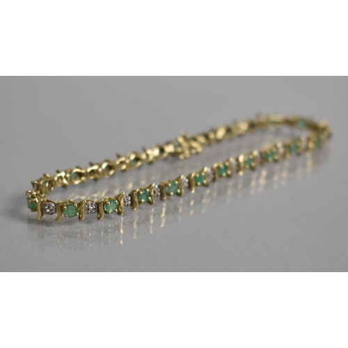29 - A 9ct Gold, Emerald and Diamond Tennis Bracelet comprising 23 Round Cut Emeralds, Each Approx 0.12ct... 