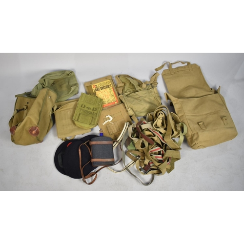 106 - A Collection of Military Canvas Bags, Berets, Water Bottle etc