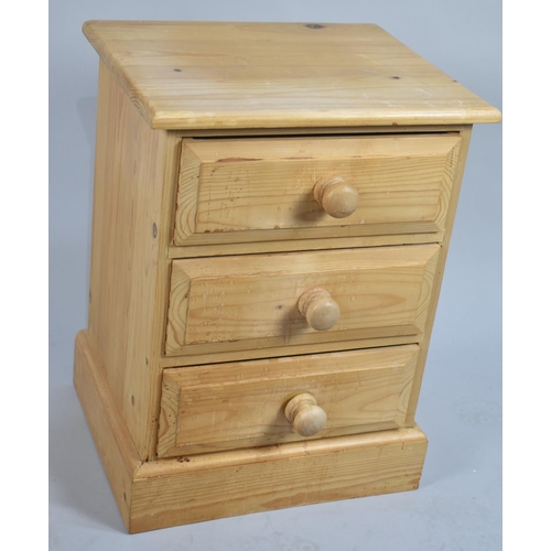 130 - A Modern Pine Three Drawer Bedside Chest, 46cm wide