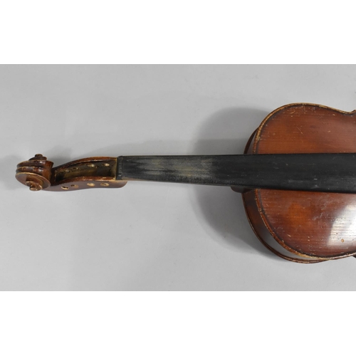 175 - A Cased Violin with Two Bows, In need of Substantial Restoration and Repair