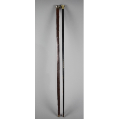 437 - A Silver Topped Malacca Walking Cane and an Ebonised Cane