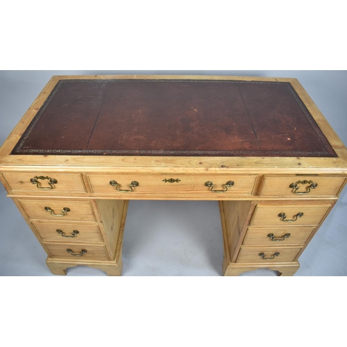 71 - An Edwardian Pine Kneehole Desk with Tooled Leather Top, Centre Drawer Flanked by Two Drawers and Th... 