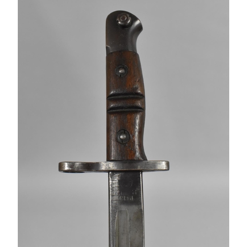 99 - A Wooden Handled Remington WWI Period Bayonet, the Blade Stamped and Dated 1913, 57cm Long Overall