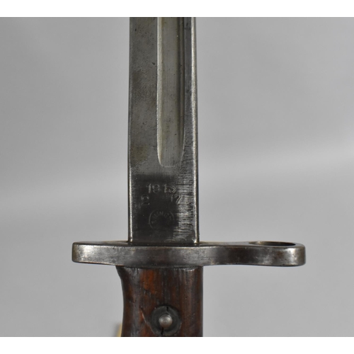 99 - A Wooden Handled Remington WWI Period Bayonet, the Blade Stamped and Dated 1913, 57cm Long Overall