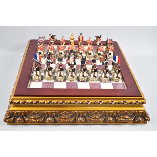 101 - A Late 20th century Bonaparte and Wellington Chess Set, 42cms Square