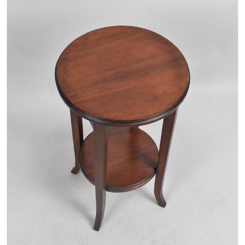 161 - a Small Circular Mahogany Plant Stand with Stretcher Shelf, 27cm Diameter