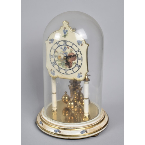 93 - A 1950s Enamelled Brass Pillar Clock under Glass Dome, 23cms High