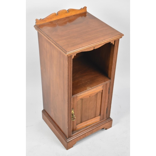 65 - An Edwardian Galleried Bedside Cabinet with Panelled Door to Base Section, 38cms Wide and 80cms High