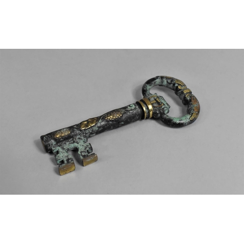 92 - A Modern Novelty Corkscrew in the form of a Large Brass Door Key with Green Verdigris Decoration, 13... 