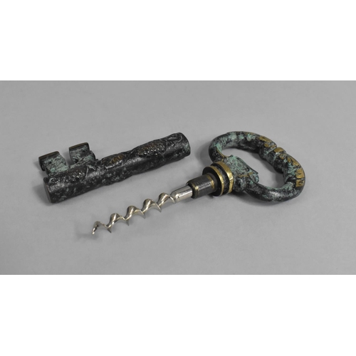 92 - A Modern Novelty Corkscrew in the form of a Large Brass Door Key with Green Verdigris Decoration, 13... 