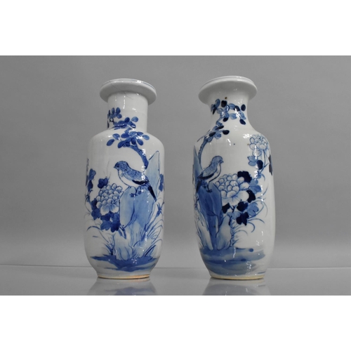 362 - A Near Pair of Chinese Porcelain Blue and White Rouleau Vases decorated with Bird standing on Rock w... 