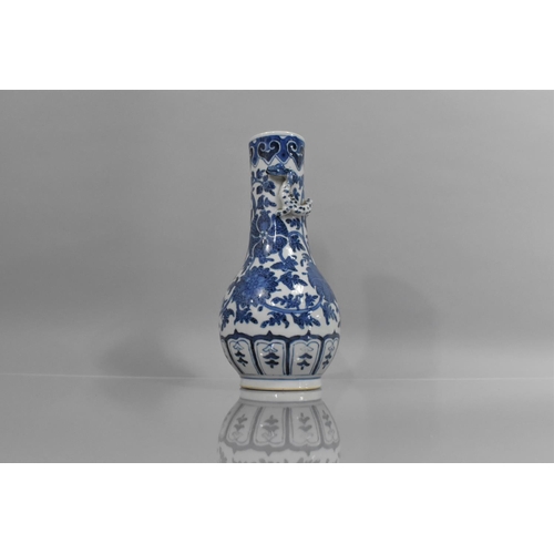 360 - A Chinese Blue and White Vase of Bottle Form having Applied Crawling Dragon to Neck, 27cms High