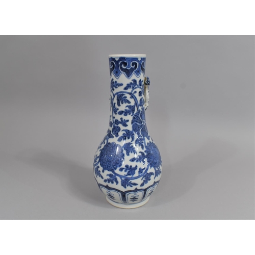 360 - A Chinese Blue and White Vase of Bottle Form having Applied Crawling Dragon to Neck, 27cms High