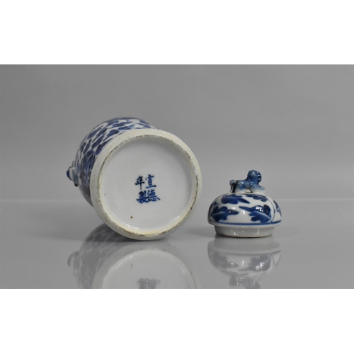 359 - A 19th Century Chinese Blue and White Lidded Vase of Baluster Form, having Twin Handles, Temple Lion... 