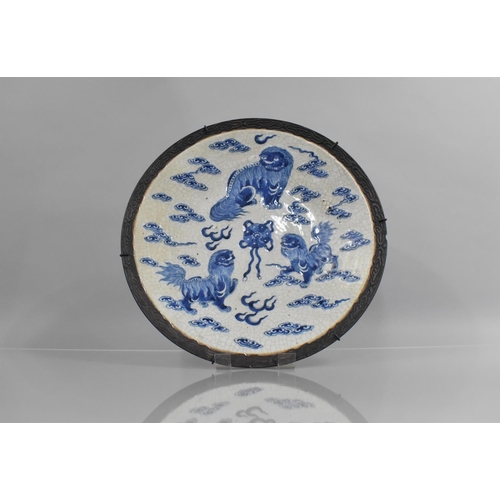 353 - A Chinese Porcelain Blue and Wite Nanking Crackle Glazed Charger, Decorated with Temple Lions and Sc... 