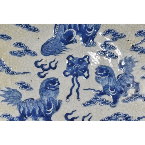 353 - A Chinese Porcelain Blue and Wite Nanking Crackle Glazed Charger, Decorated with Temple Lions and Sc... 