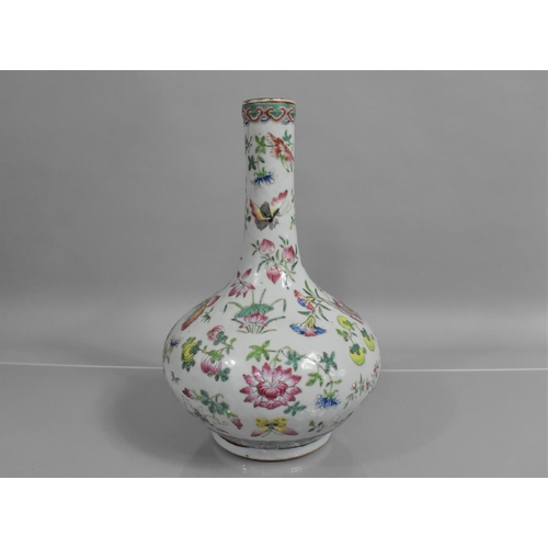 317 - A 19th Century Chinese Porcelain Celadon Glazed  Famille Rose Bottle Vase decorated with Flowers, Bu... 