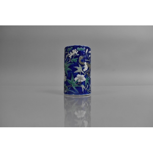 310 - A Late 19th/Early 20th Century Chinese Porcelain Cylindrical Brush Pot decorated with Dragons on Blu... 