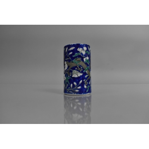 310 - A Late 19th/Early 20th Century Chinese Porcelain Cylindrical Brush Pot decorated with Dragons on Blu... 