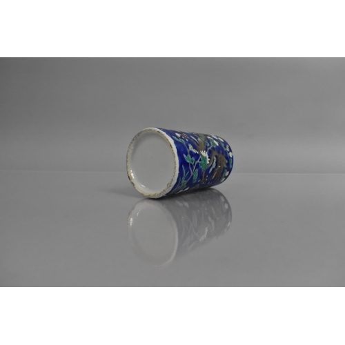 310 - A Late 19th/Early 20th Century Chinese Porcelain Cylindrical Brush Pot decorated with Dragons on Blu... 