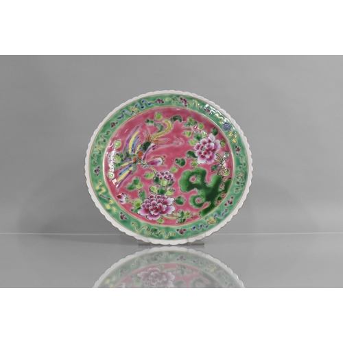 307 - A Peranakan Nyonya Straits Type Plate decorated with Phoenix and Flowers on Pink Ground with Green B... 