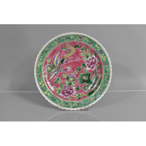 307 - A Peranakan Nyonya Straits Type Plate decorated with Phoenix and Flowers on Pink Ground with Green B... 