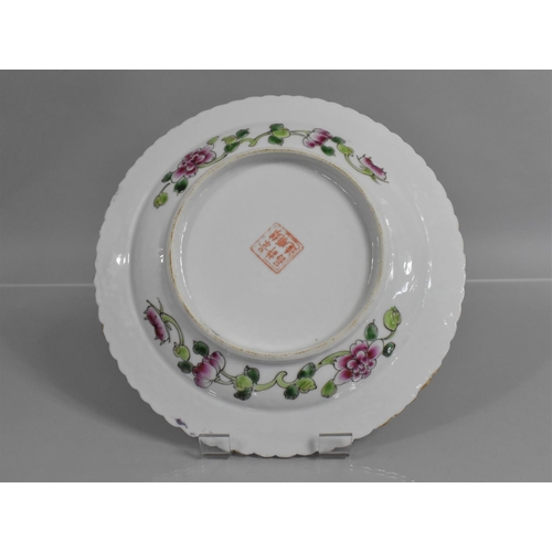 307 - A Peranakan Nyonya Straits Type Plate decorated with Phoenix and Flowers on Pink Ground with Green B... 