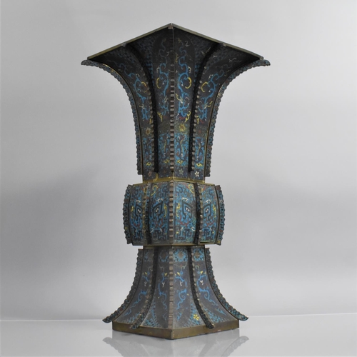 An Impressive Chinese Cloisonne Enamelled Gu Shaped Vase, Decorated with Polychrome Enamels depicting Dragons and Archaic Mask Design on Blue Ground, Four Character Marks to Base, Some Condition Issues, 52cms High