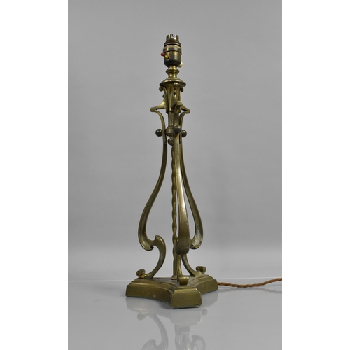 157 - An Edwardian Brass Table Lamp of Triform Shape with Scrolled Supports and Centre Twisted Pole, plint... 