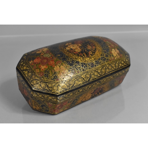 141 - A Kashmiri Papier Mache Box and Cover of Canted Rectangular Form with Polychrome Enamels on a Black ... 