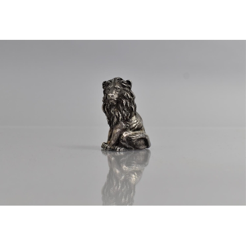 241 - A Magrino Filled Silver Study of a Seated Lion, 5cms High