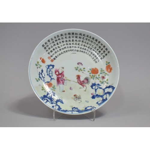 329 - A Chinese Porcelain Plate decorated in the Famille Rose Palette with Figure, Cockerel, Chicken and C... 