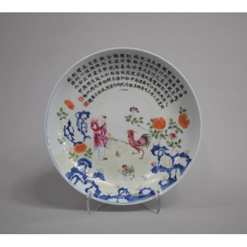 329 - A Chinese Porcelain Plate decorated in the Famille Rose Palette with Figure, Cockerel, Chicken and C... 