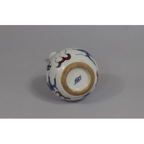 365 - A Chinese Porcelain Bottle Neck Vase Decorated with Blue Dragons and Red Highlights, Leaf Mark to Ba... 